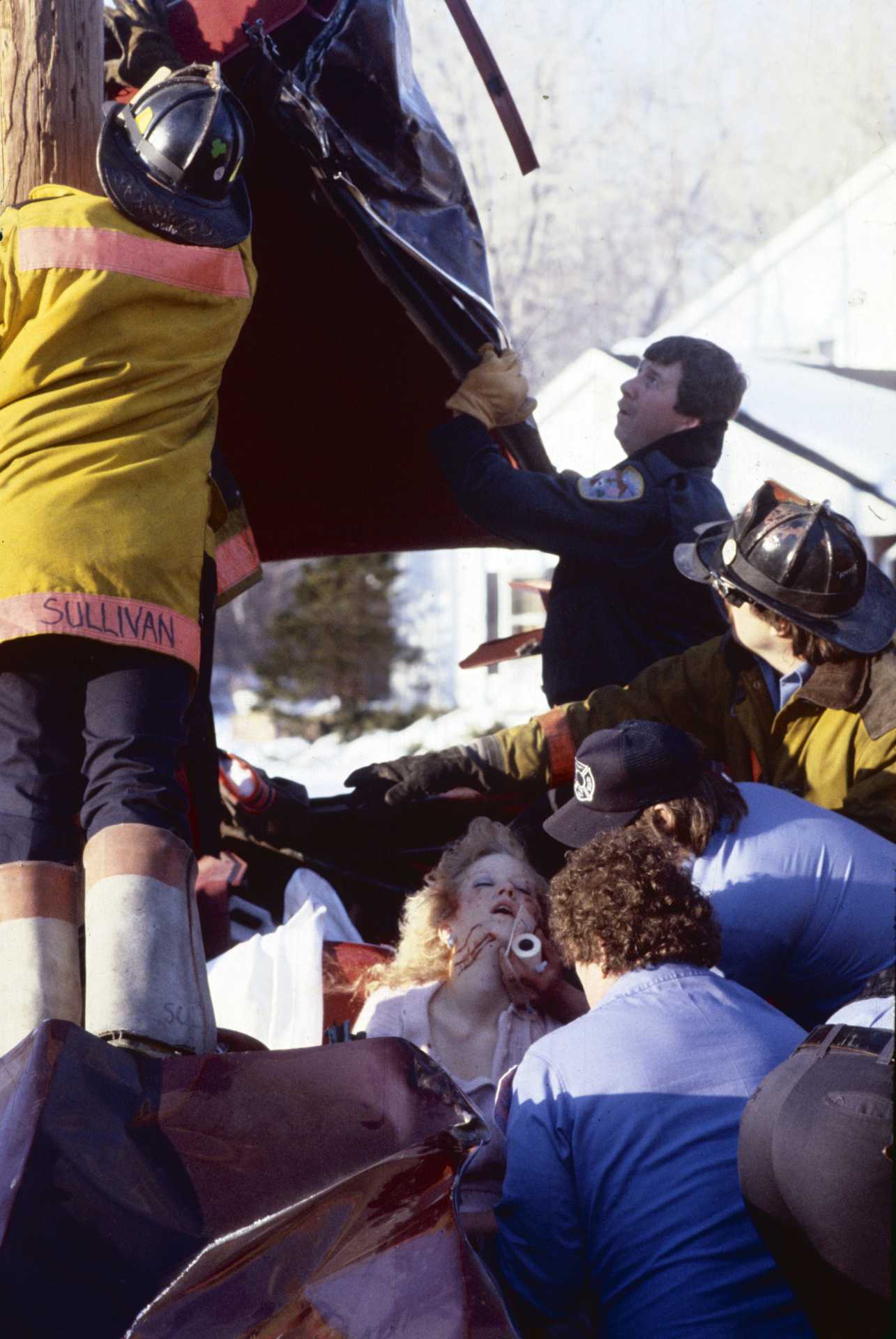 A 17-year-old youth was killed and his girlfriend critically injured when their car collided with an empty school bus. 